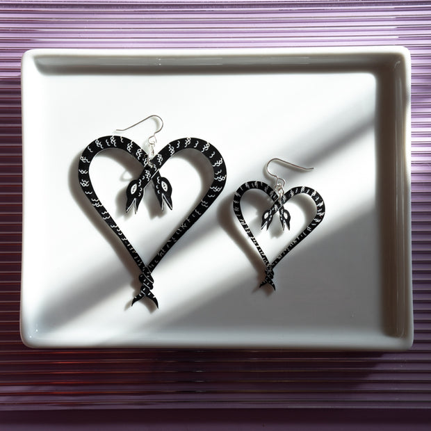 Comparison shot of Large and Small Heart of Snakes Earrings