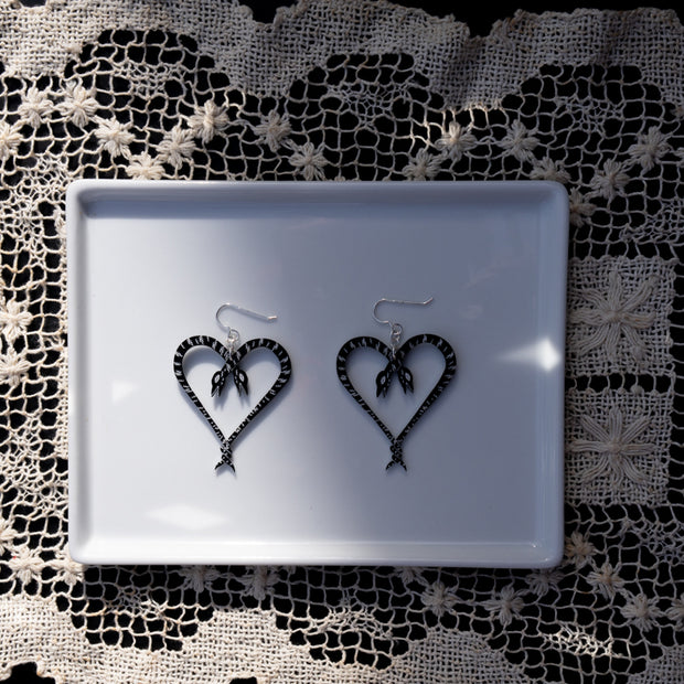Small Heart of Snakes Earrings on White Tray