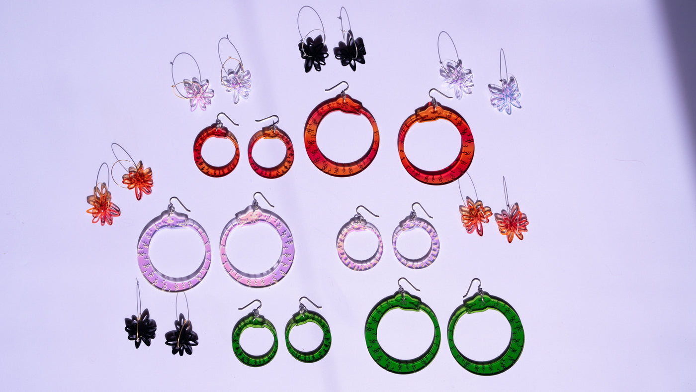 Ouroboros Earrings and flower hoops