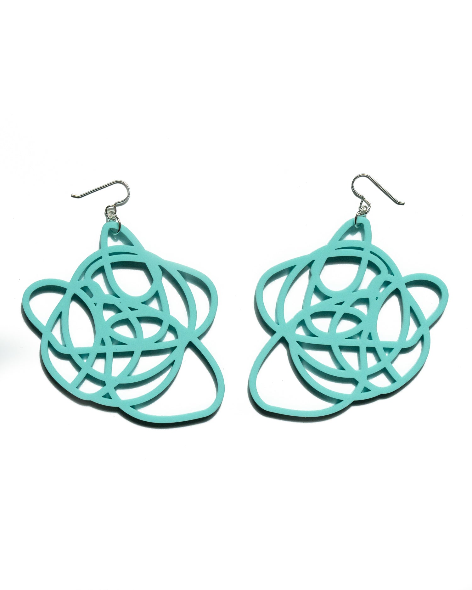 Aqua grande earrings over white