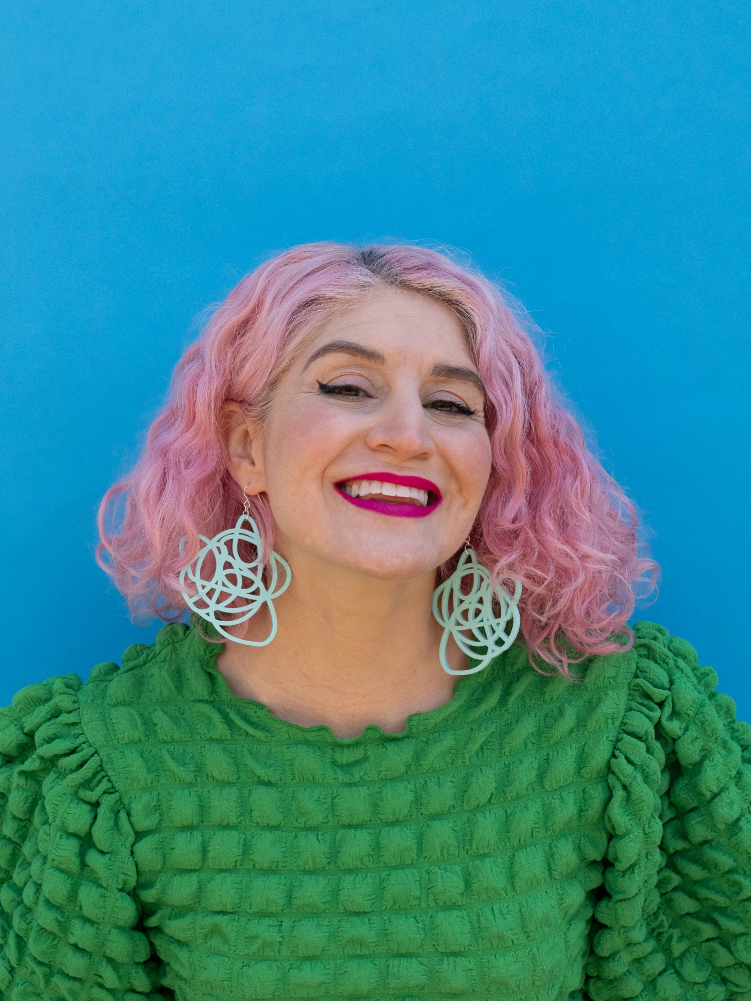 Aqua grande earrings on model