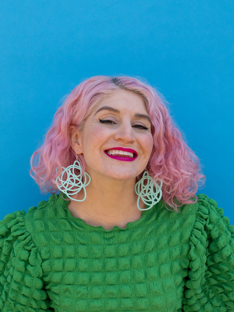 Aqua grande earrings on model