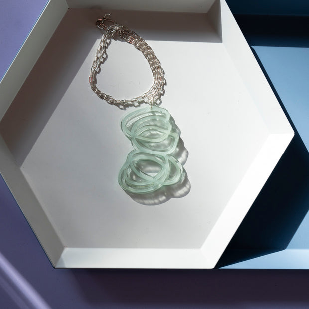 Janus Clear Pendant Necklace