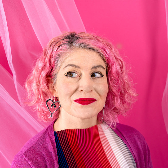 Small Heart of Snakes Earring on Model