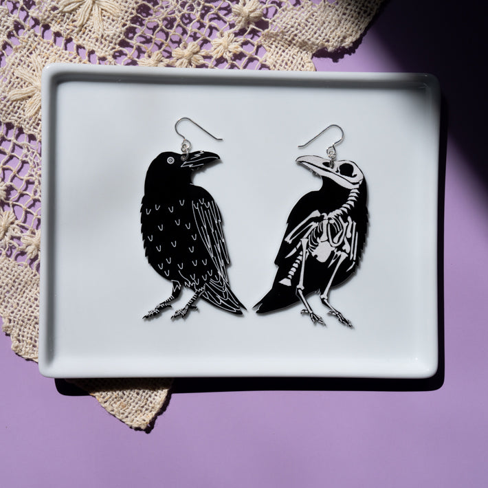 Large raven skeleton earrings