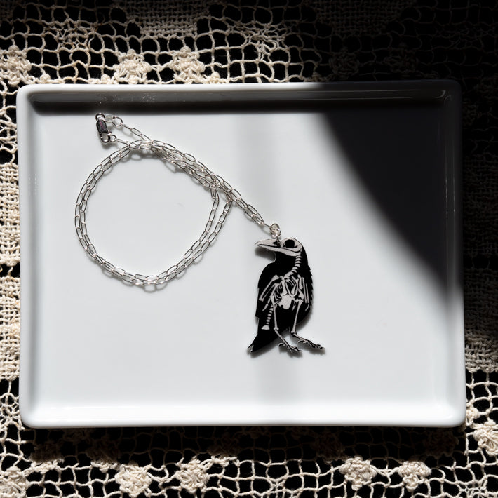 Raven skeleton necklace, skeleton side shown