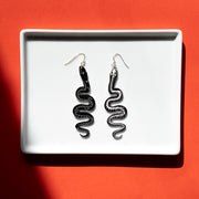 Large snake skeleton earrings