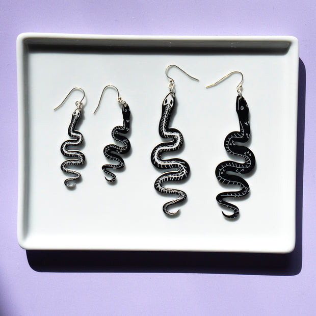 snake skeleton earrings large and small
