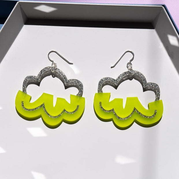 lime green cloud earrings shown on white tray