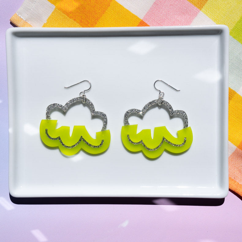 lime green cloud earrings shown on white tray