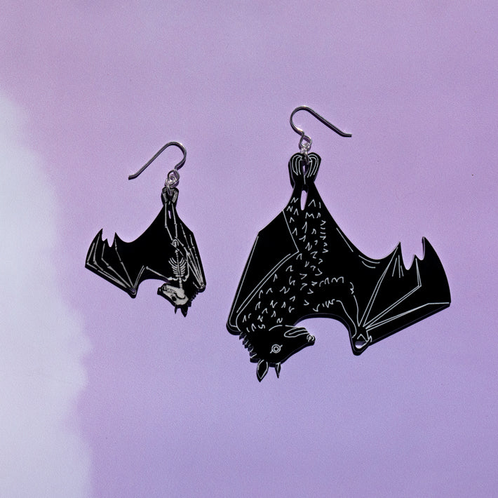 small and large skeleton earrings