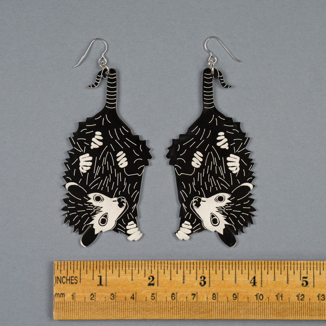 Large Baby Possum Earrings shown above ruler