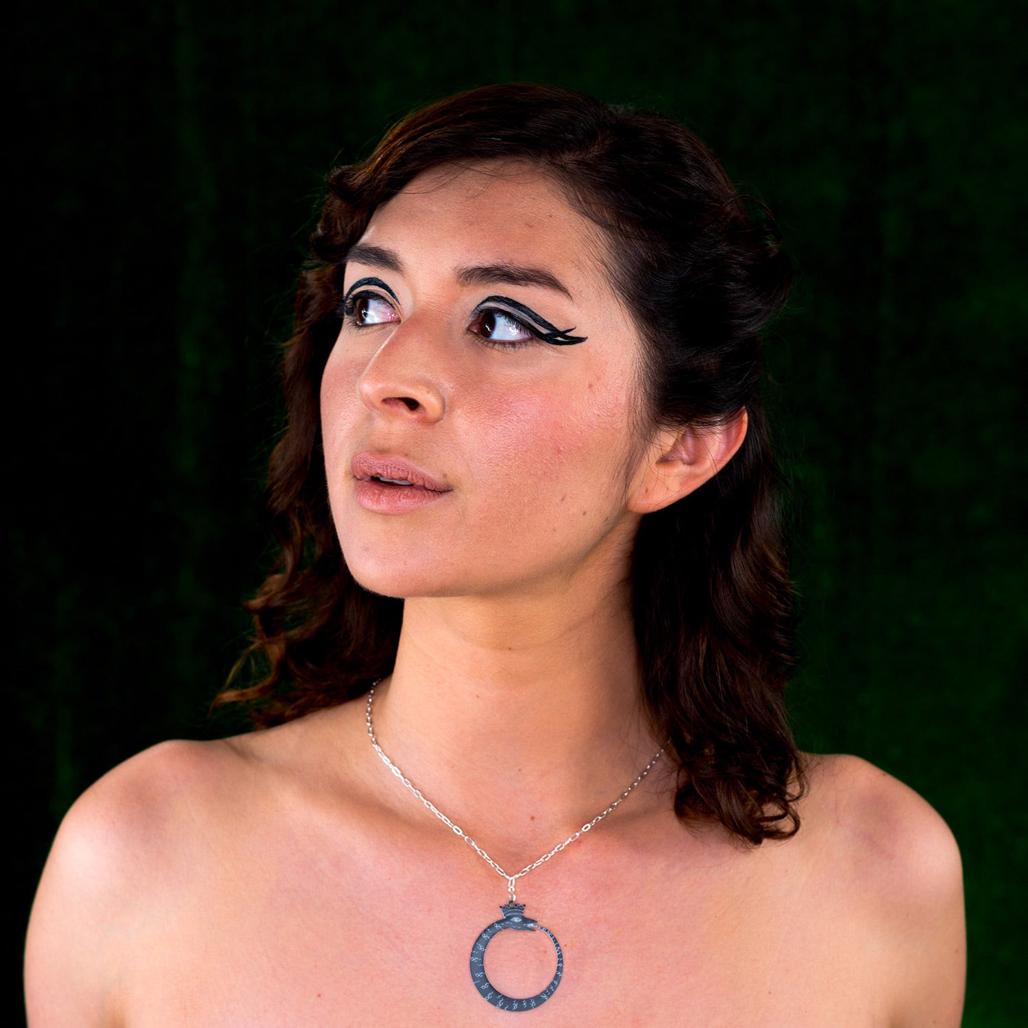 black ouroboros necklace on model