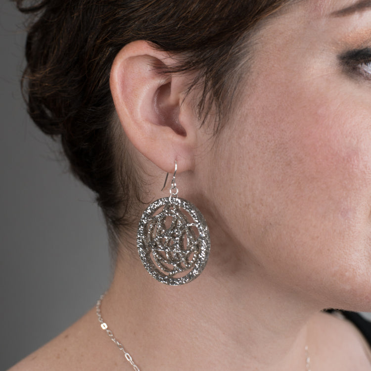 Silver Circle Earrings on model