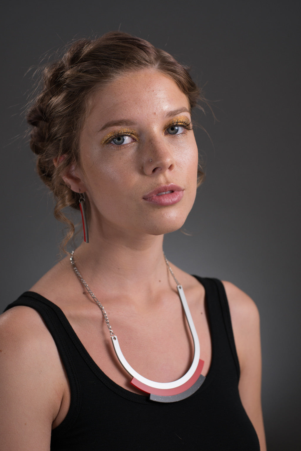 long silver necklace on model