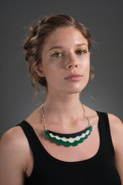 green collar necklace on model