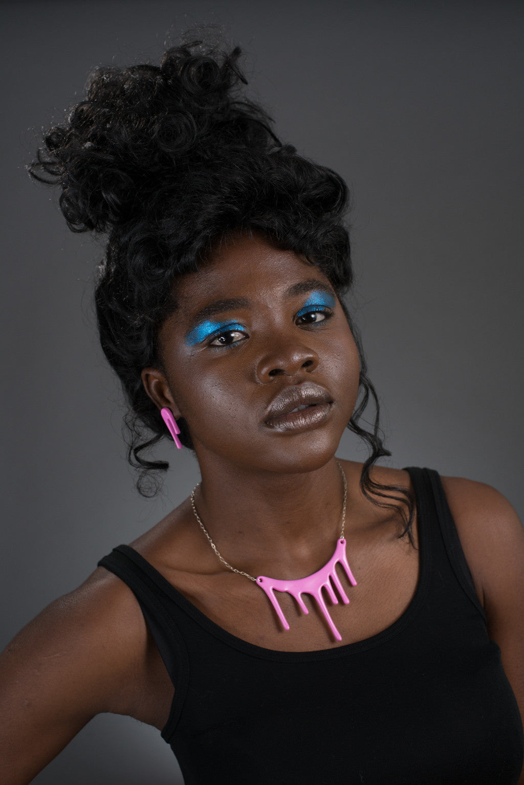 pink necklace on model