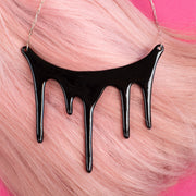 drip black statement necklace styled