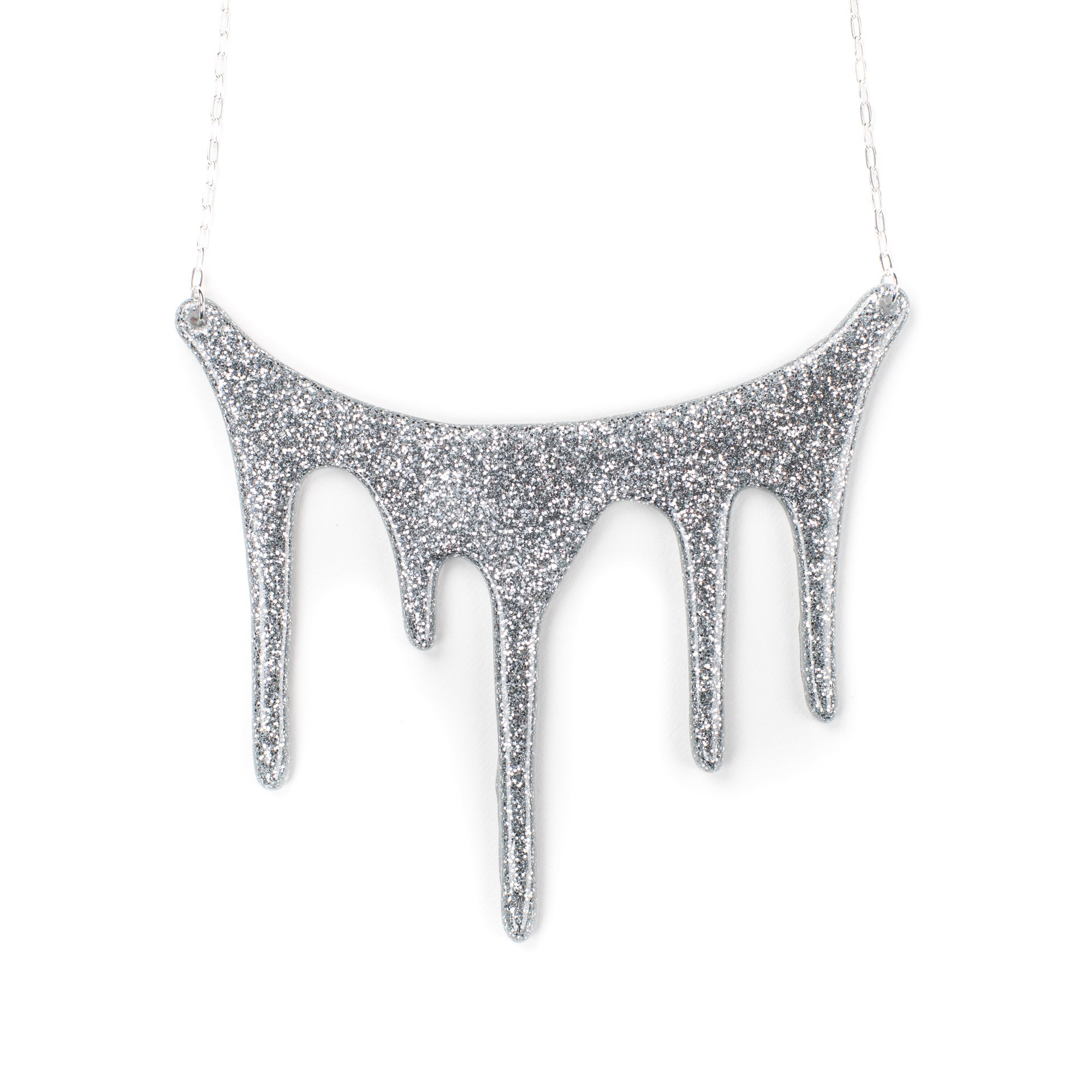 drip silver statement necklace over white
