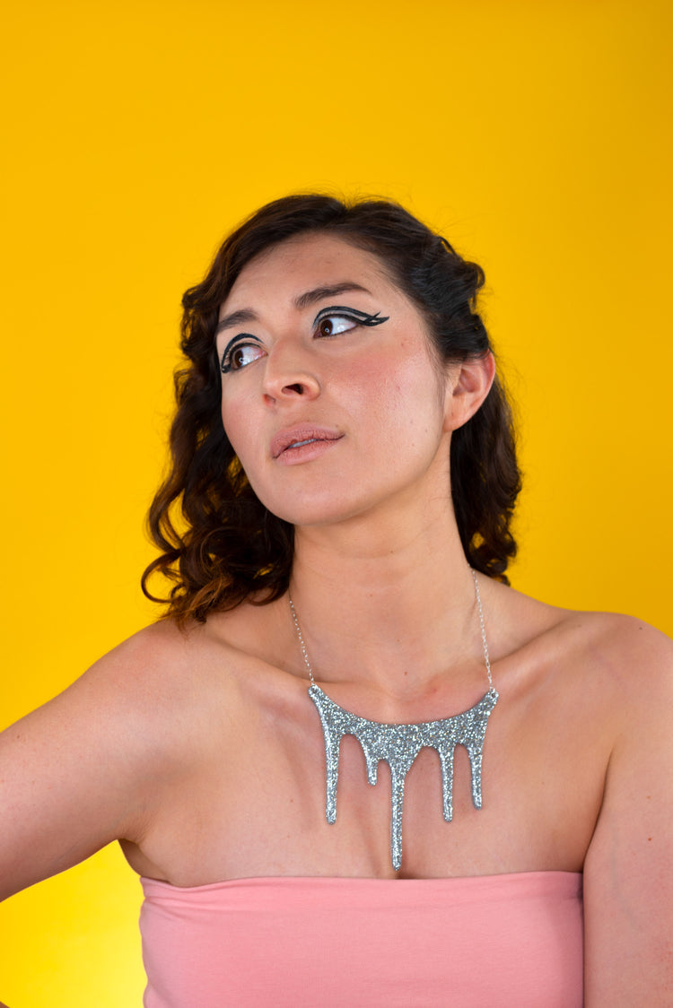drip silver statement necklace on model