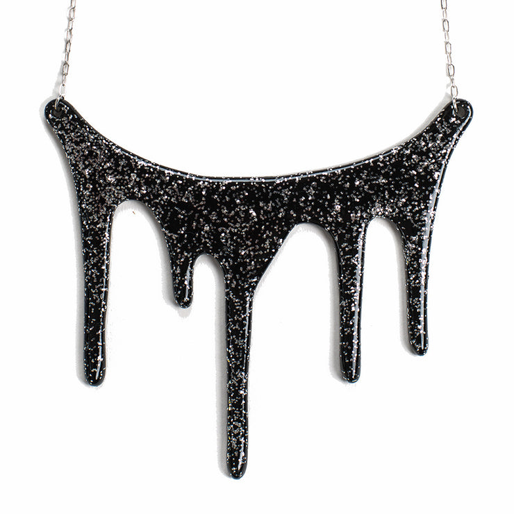Black and silver Statement Necklace over white