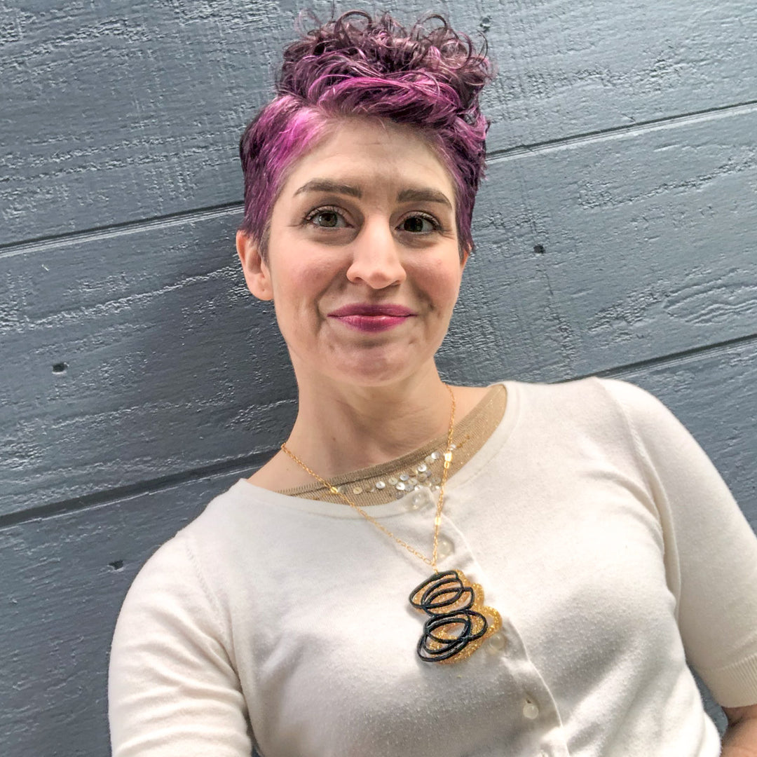 Janus Black and Gold Glitter Pendant Necklace
