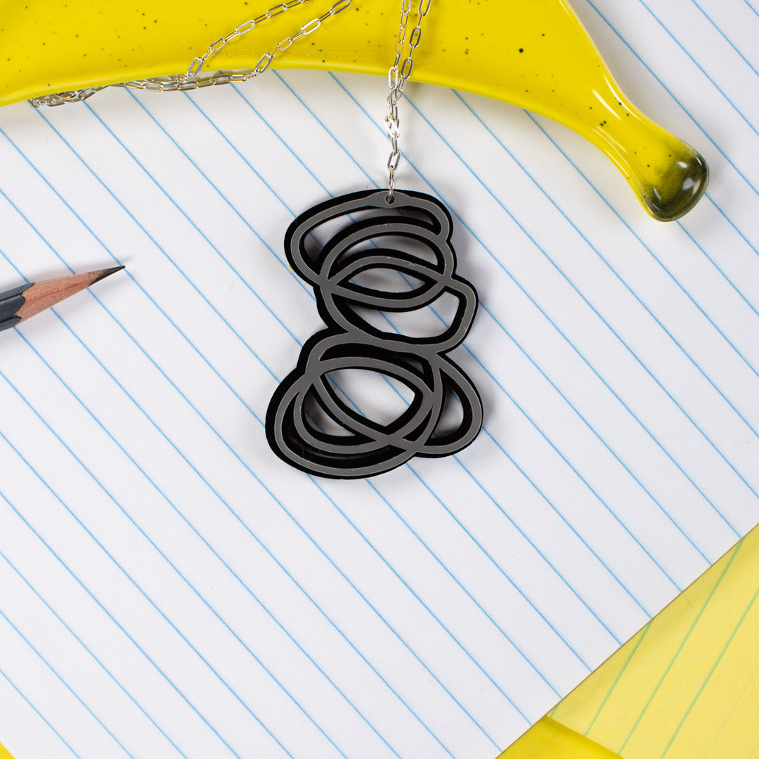 Janus Black and Silver Pendant Necklace