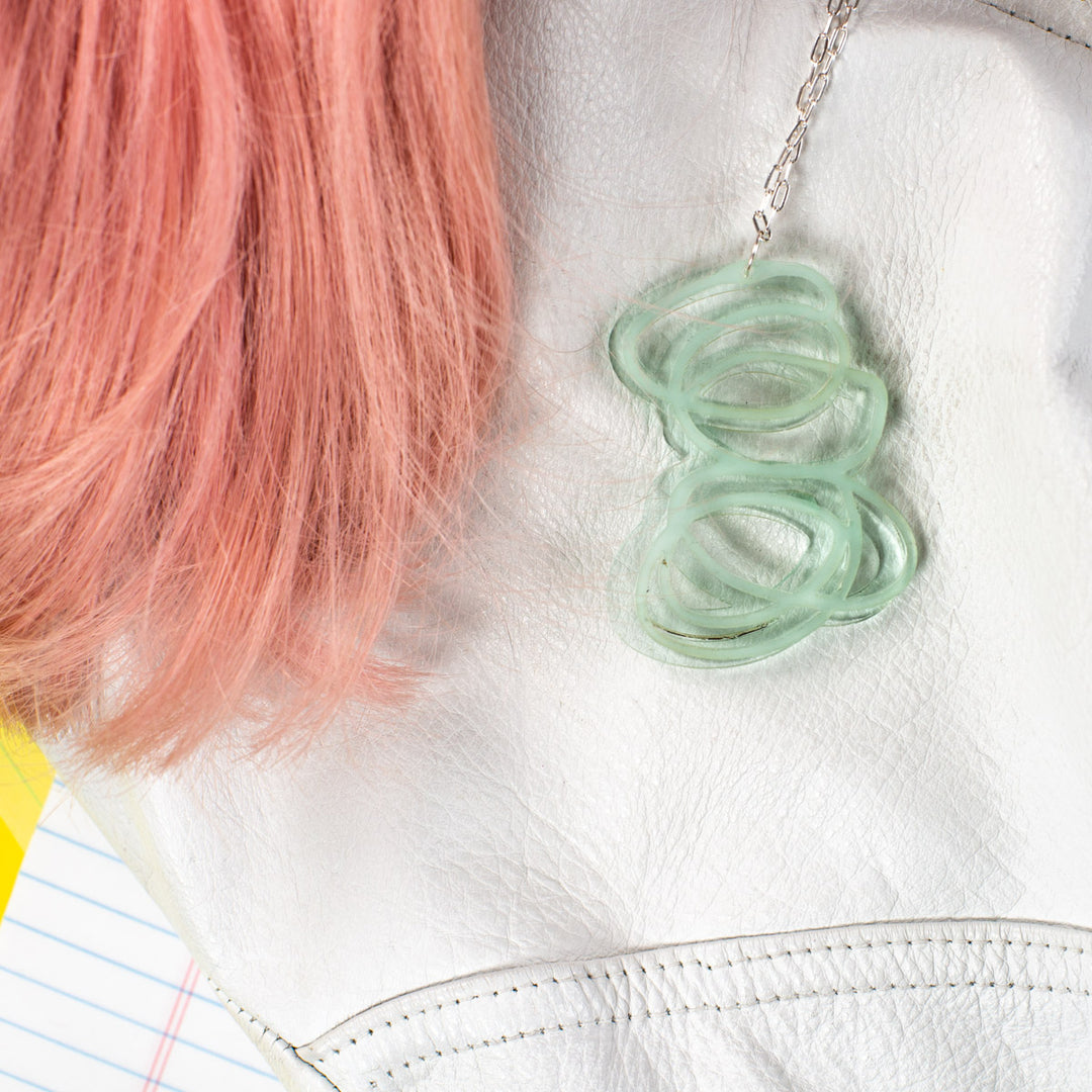 Janus Clear Pendant Necklace