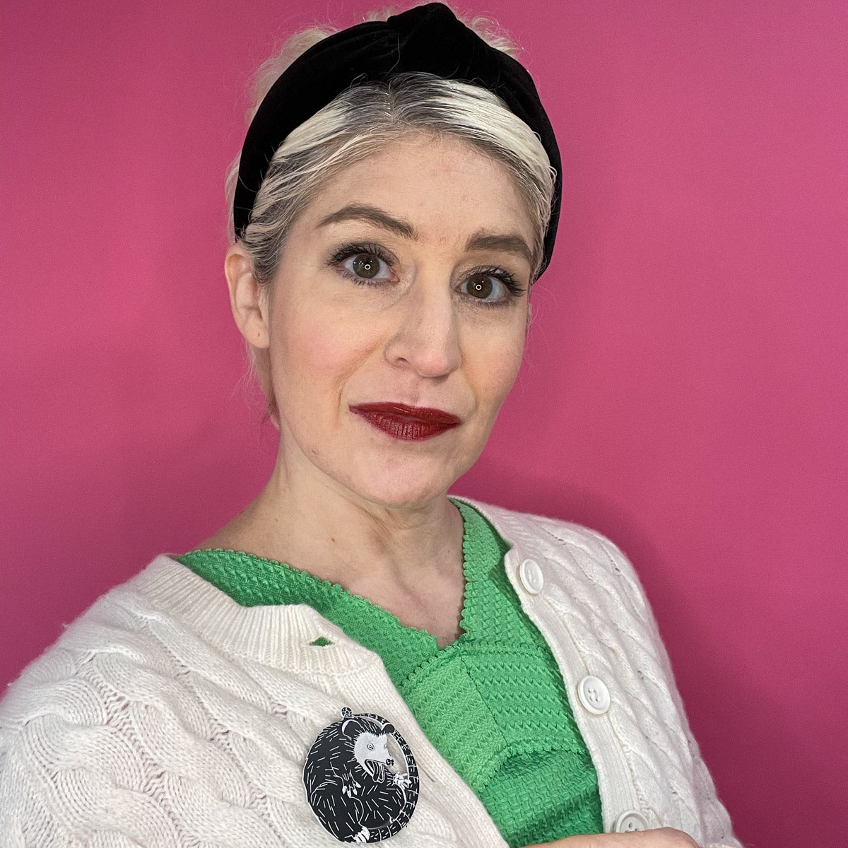 model wearing Playing Dead possum pin