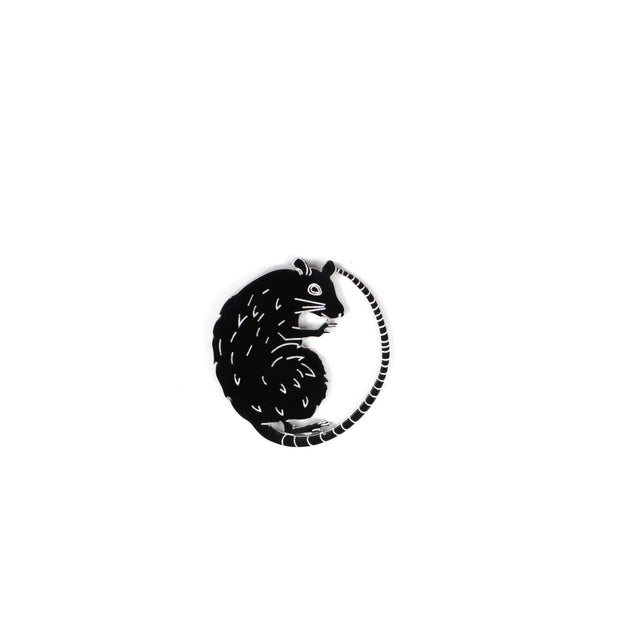 black rat pin on white background