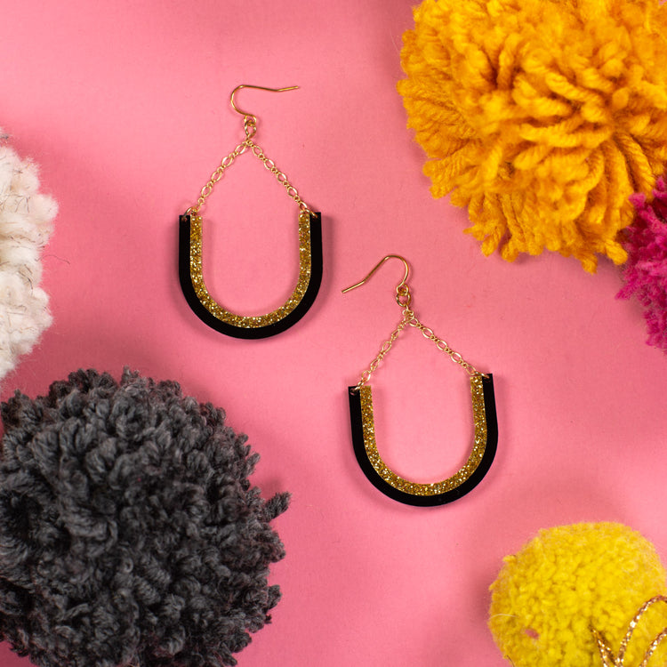 black and gold dangle earrings