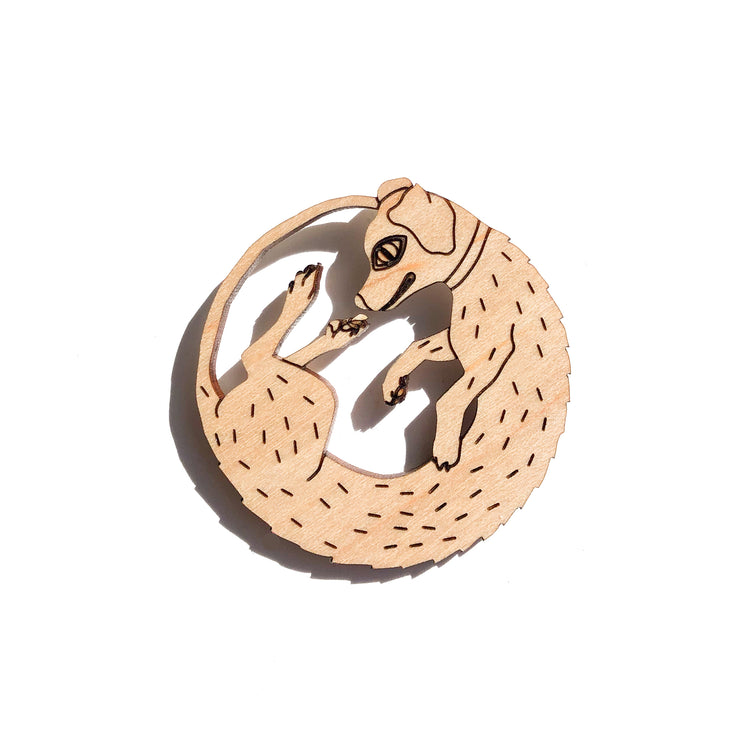 wood dog pin over white background
