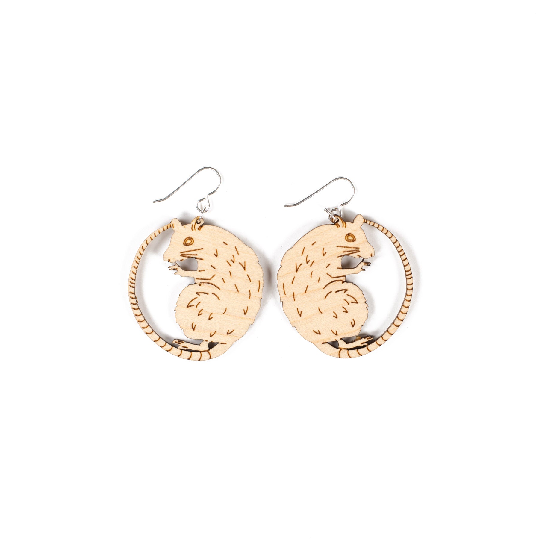 small wood rat earrings on white background