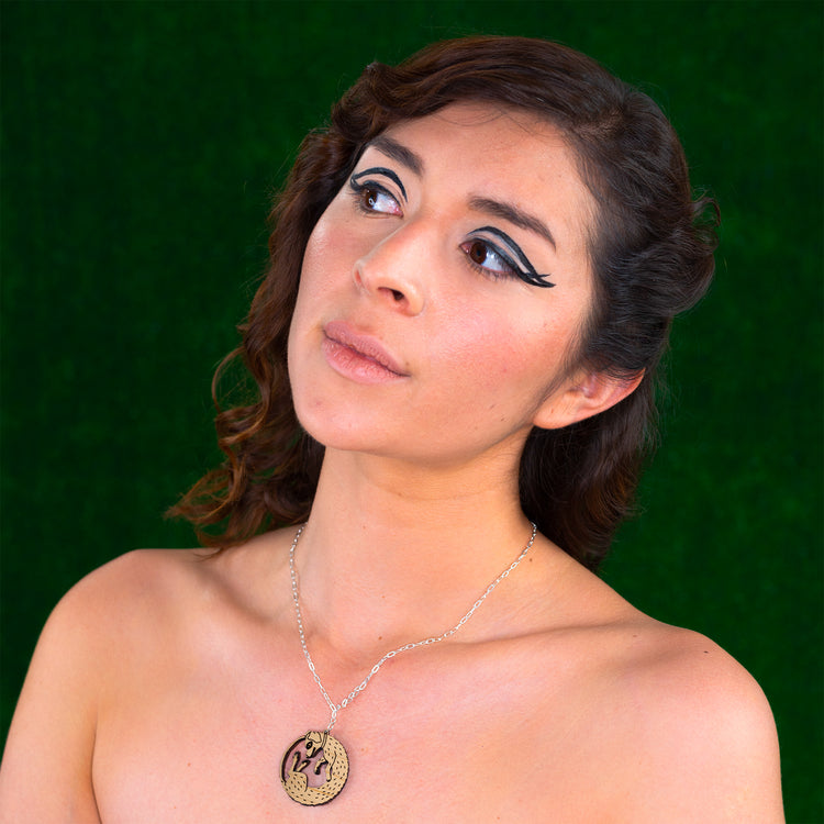 wood dog necklace on model