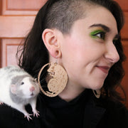 large wood rat earrings on model with rat