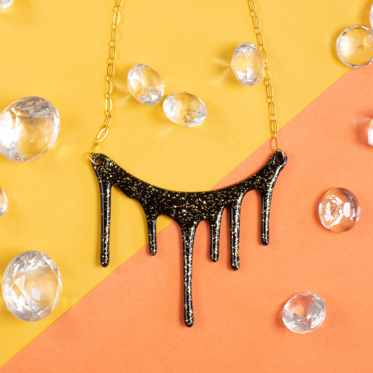 black and gold glitter necklace styled