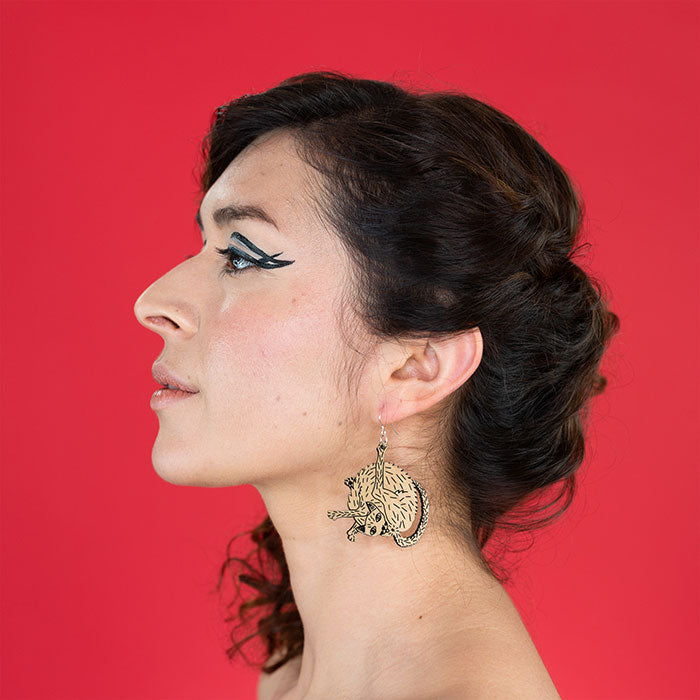 small wood cat earrings on model