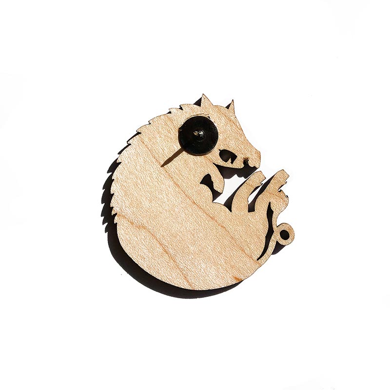 reverse side of wood boar pin