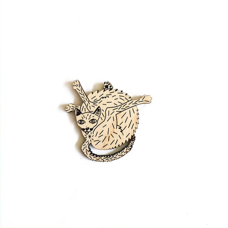 wood cat pin over white background